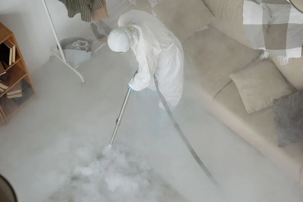 Biohazard cleanup technician in protective equipment, Heber Springs, AR